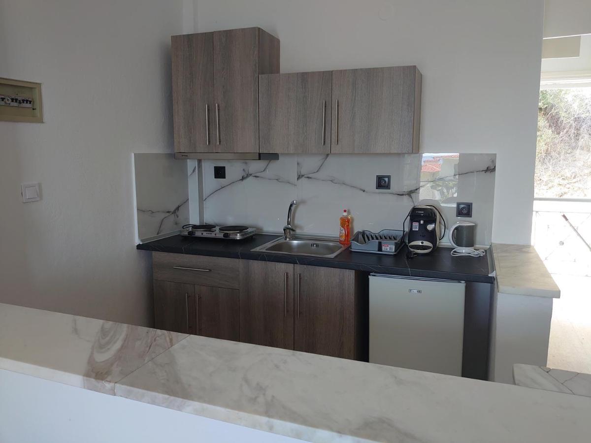 Merida Apartments Mola Kalyva Esterno foto